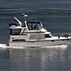 Boaters enjoy sunshine and sandbar clam search